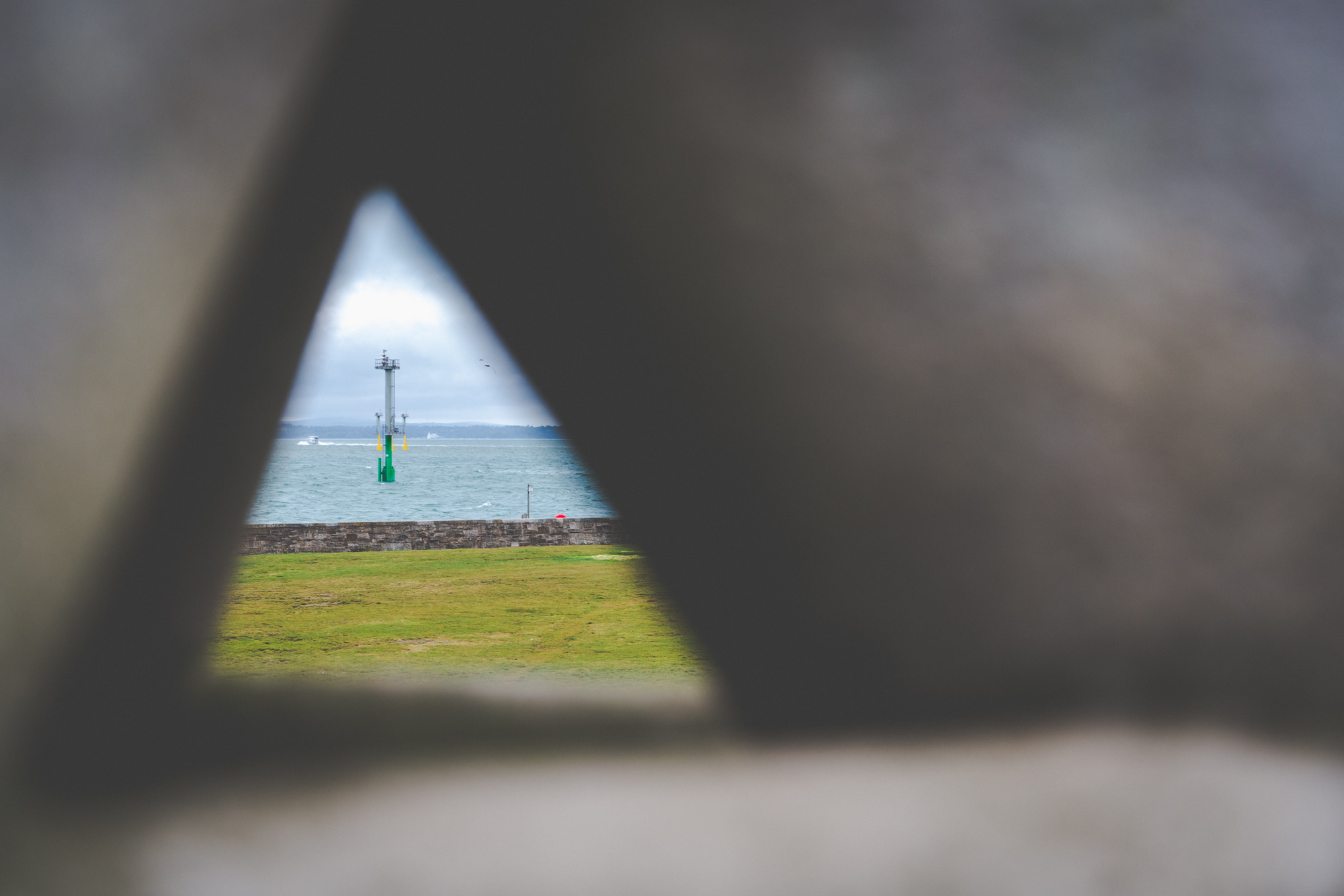 View throught eh Bandstand John Maine concrete scultures, with a view out to the Solent