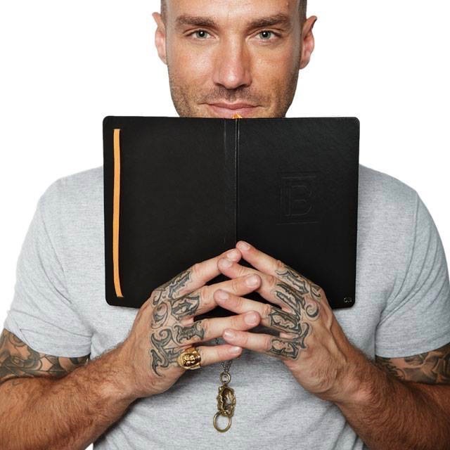 Calum Best with a copy of Best Me Life.