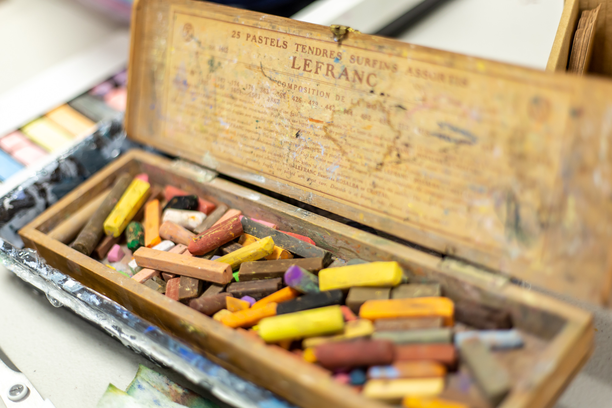 Box full of colourful artist's chalk