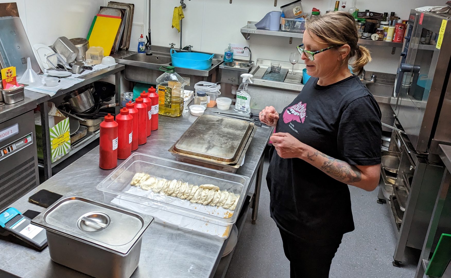 Gemma inside the Pollito Loco kitchen